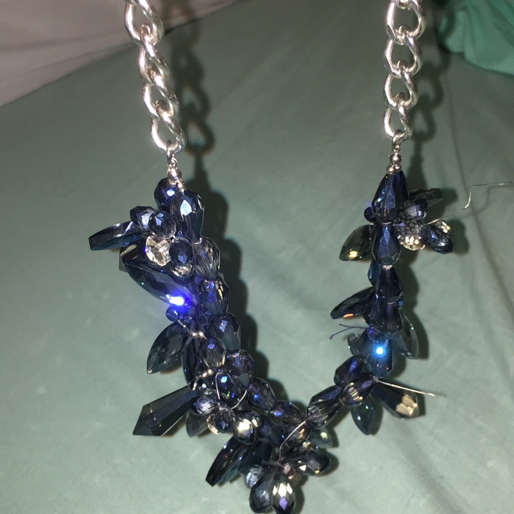 A blue and silver diamond necklace